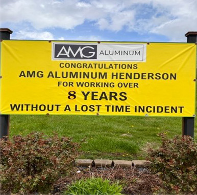 Outdoor sign indicating 8 years without time loss incident at Henderson's location